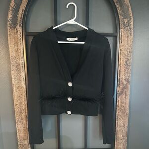 Elegant Black Cardigan with Feather Trim